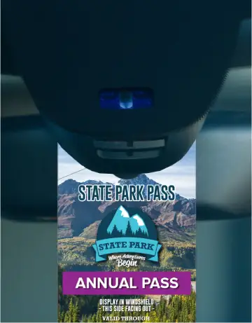 Parking pass hanging on rear view mirror