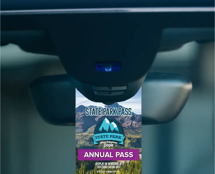 Parking pass hanging on rear view mirror